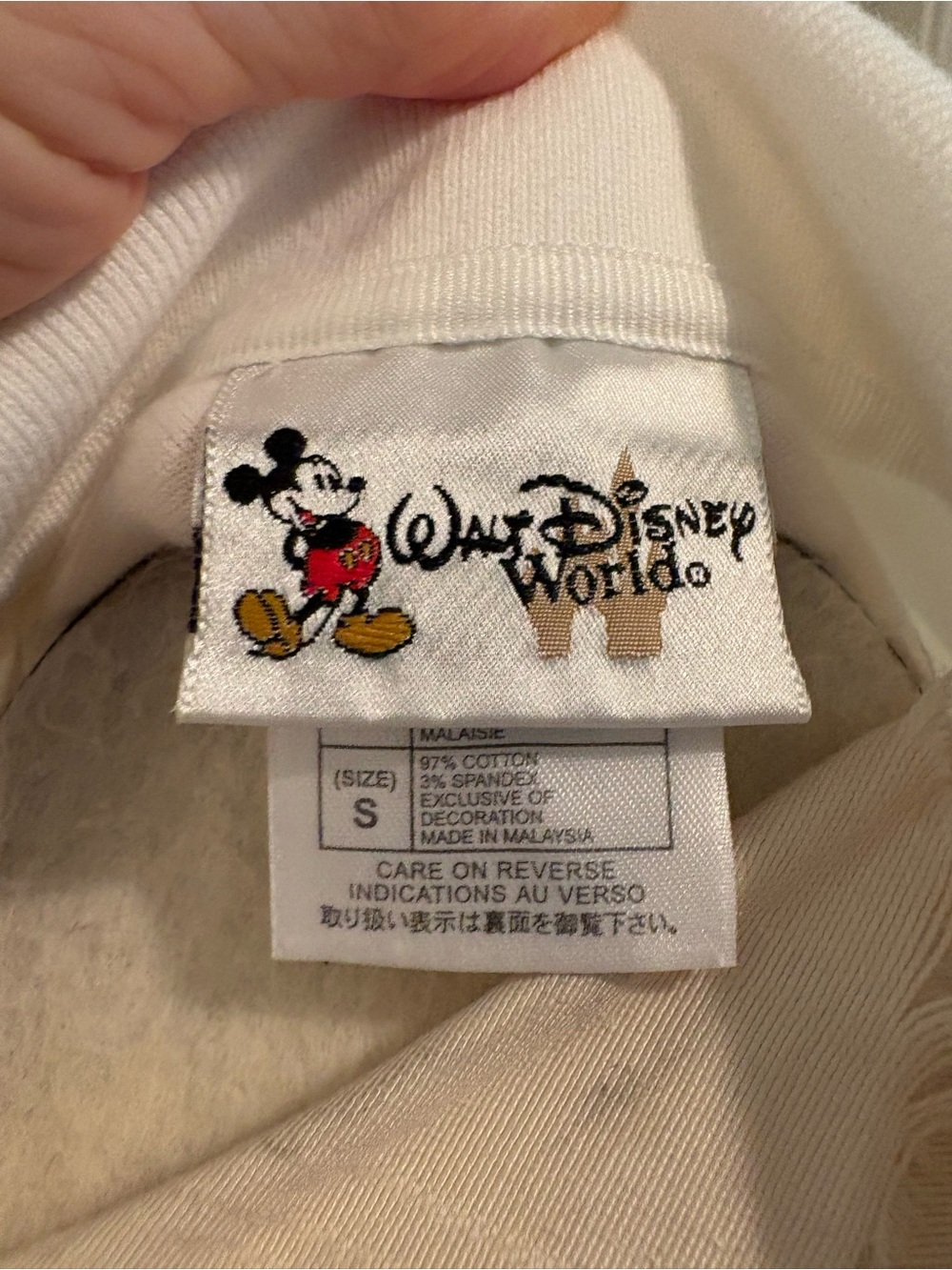 Disney women’s White Polo Shirt with Green Crest - size Small - Picture 12 of 13
